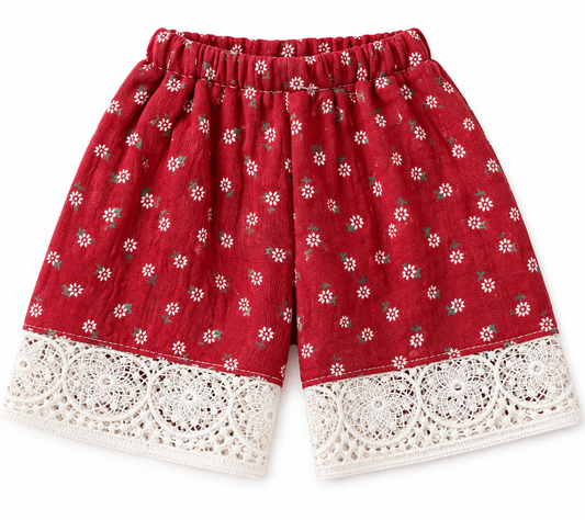 Amelie's red Vintage Bloom Shorts with tiny floral print and white lace-trimmed hems