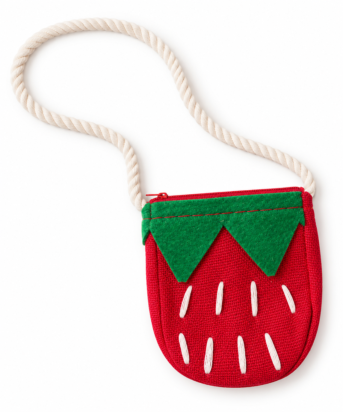 Amelie's red Strawberry Sweetheart Bag with green leaf details, white stitched seeds, and a cream rope strap